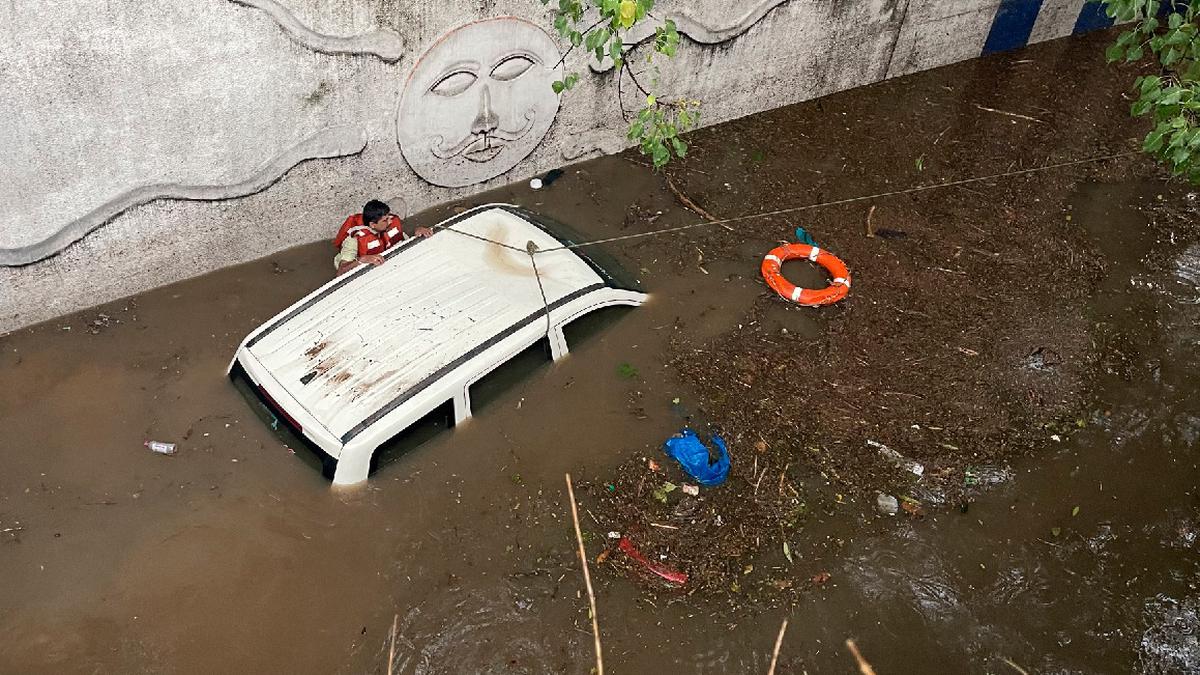 Woman Loses Life as Vehicle Submerges in Waterlogged Underpass Amidst Heavy Rainfall